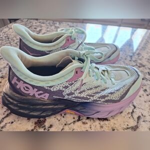 Green and Purple Athletic Shoes with Modern Design